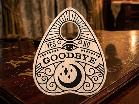 Engraved wooden planchette